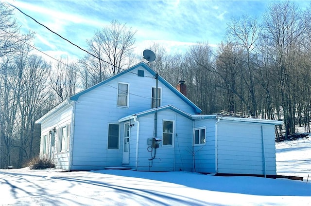 view of snow covered property