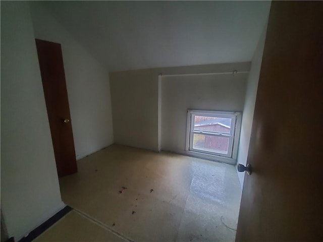 bonus room featuring vaulted ceiling