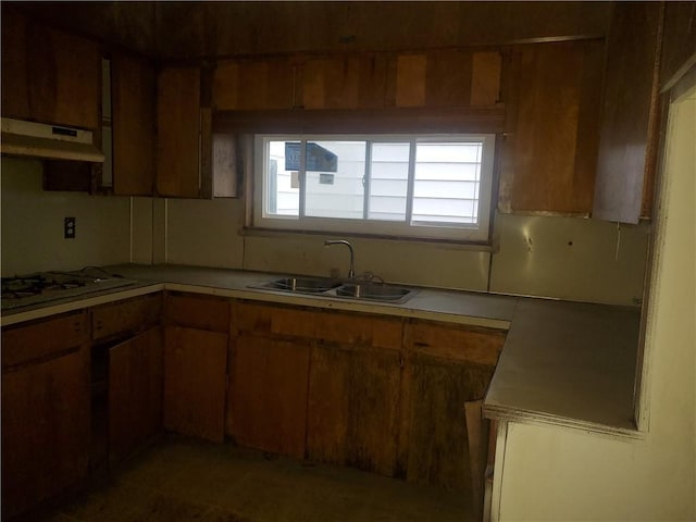 kitchen with sink, plenty of natural light, and white gas stovetop