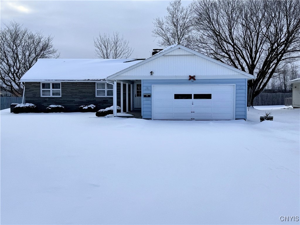 ranch-style home with a garage