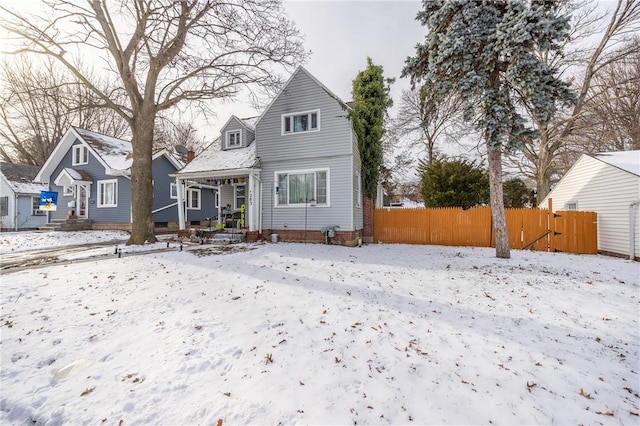 view of snow covered house