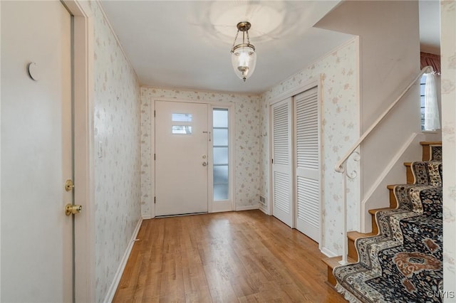 foyer entrance featuring light hardwood / wood-style floors