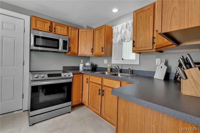 kitchen featuring appliances with stainless steel finishes and sink