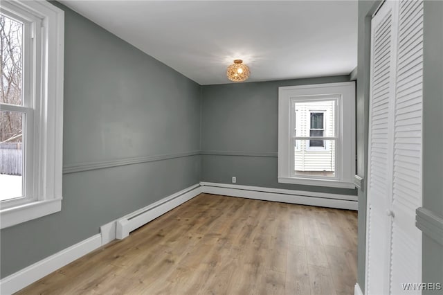 empty room with light wood-type flooring