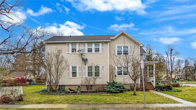 view of front of house with a front lawn