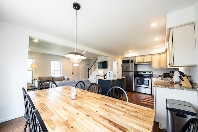 dining room featuring dark hardwood / wood-style floors