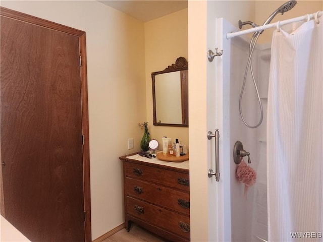 bathroom with a shower with shower curtain