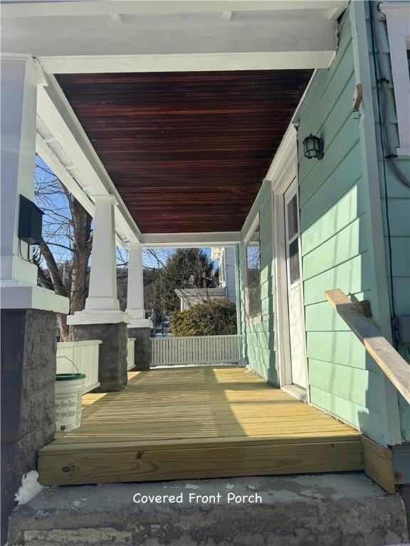 wooden terrace with covered porch