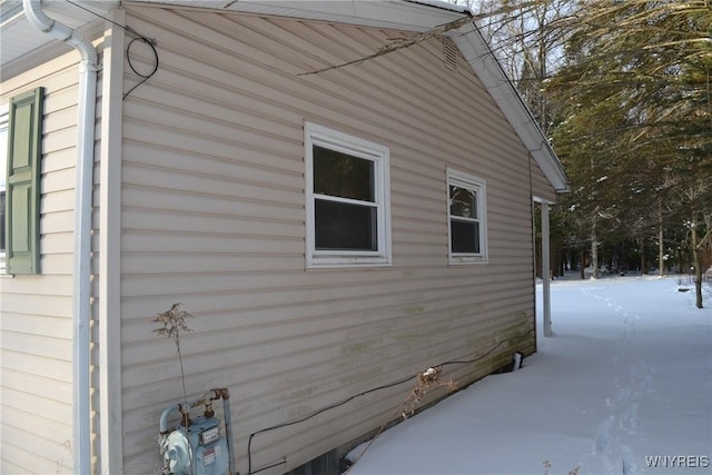 view of snow covered property