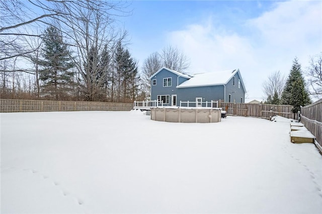 exterior space with a fenced in pool