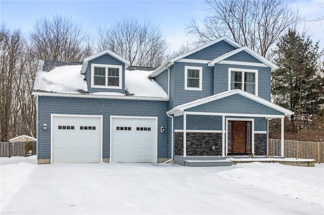 view of front of property with a garage