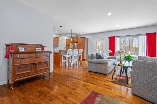 living room featuring dark hardwood / wood-style floors