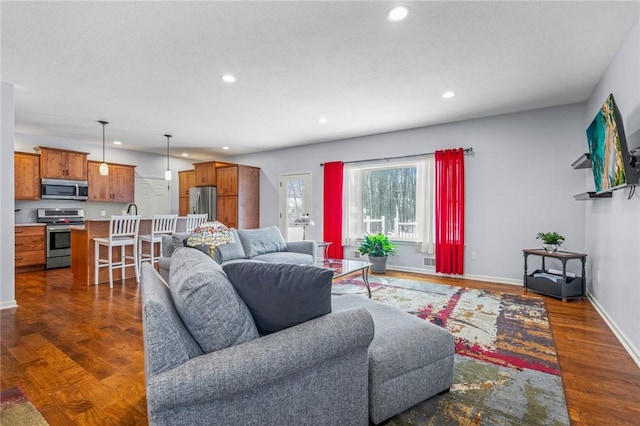 living room featuring dark hardwood / wood-style flooring