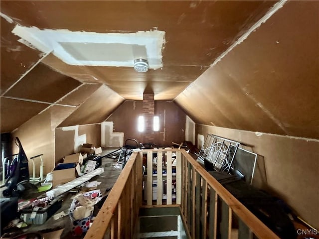 bonus room featuring lofted ceiling