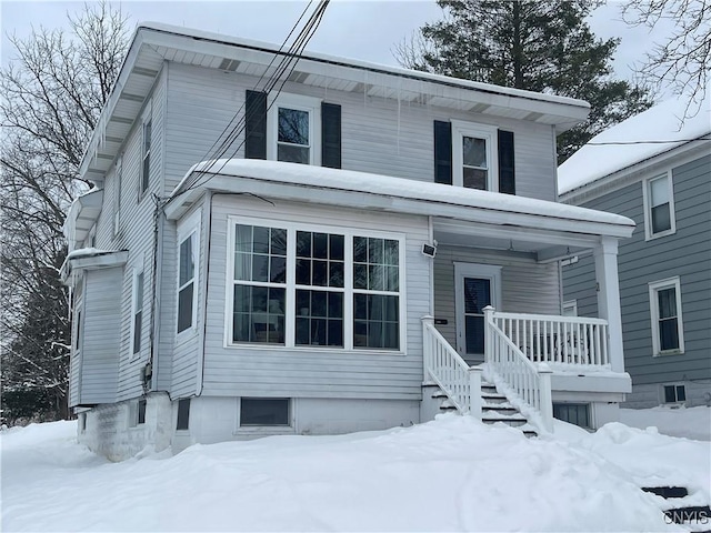 view of front of home featuring covered porch