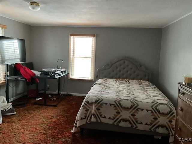 bedroom with dark carpet