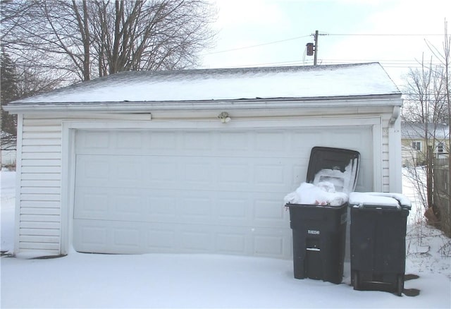 view of snow covered garage