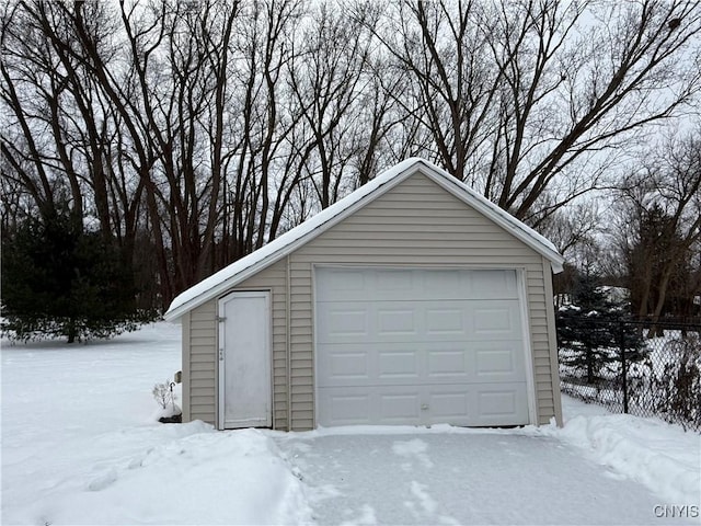 view of snow covered garage