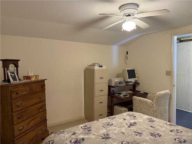 bedroom featuring ceiling fan and lofted ceiling