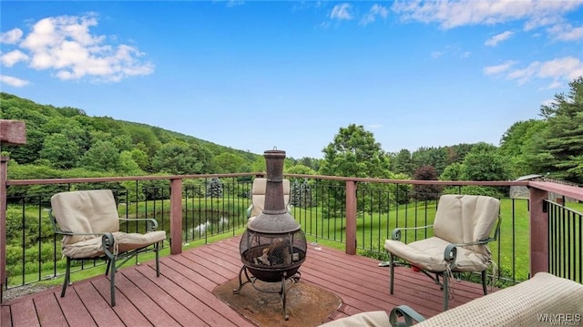 deck featuring a fire pit