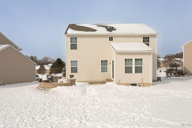 view of snow covered property