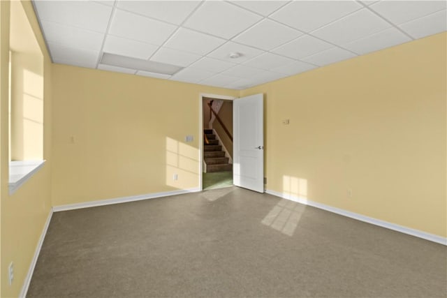 spare room featuring a drop ceiling