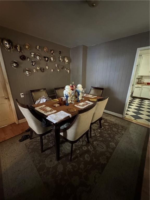 dining space with hardwood / wood-style floors