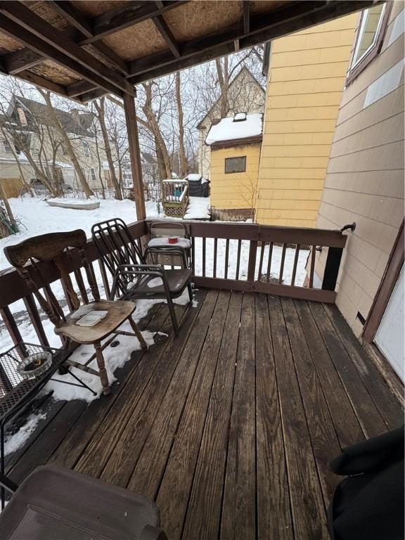 view of snow covered deck