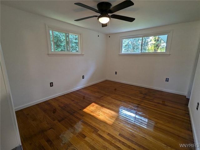 unfurnished room featuring ceiling fan and hardwood / wood-style floors