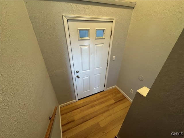 doorway to outside featuring hardwood / wood-style floors