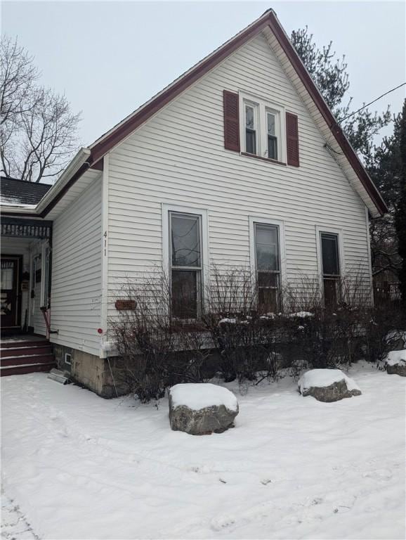 view of snow covered property