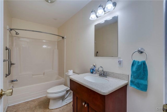 full bathroom featuring toilet, vanity, and bathtub / shower combination