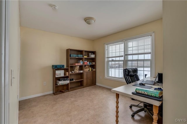 home office with light colored carpet