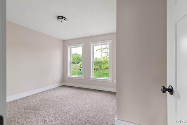 view of carpeted spare room