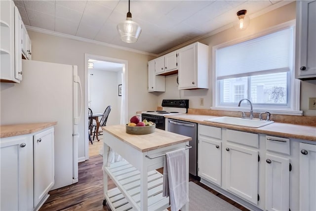 kitchen featuring dark hardwood / wood-style floors, white appliances, decorative light fixtures, white cabinets, and sink