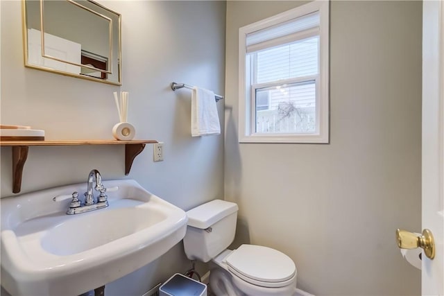 bathroom featuring sink and toilet