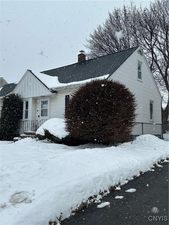 view of snow covered property