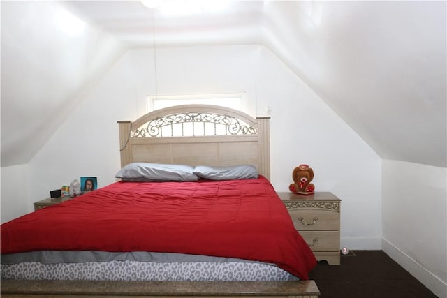 bedroom with vaulted ceiling