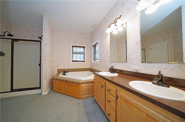 bathroom with independent shower and bath and vanity