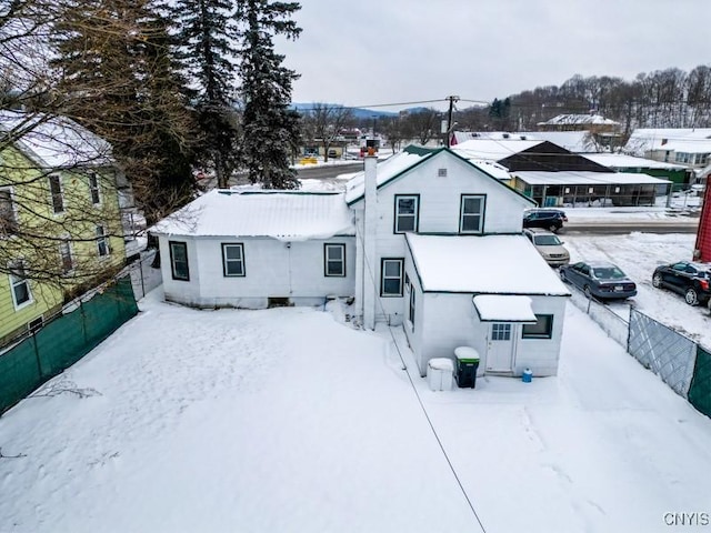 view of snow covered property