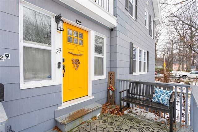 view of snow covered property entrance