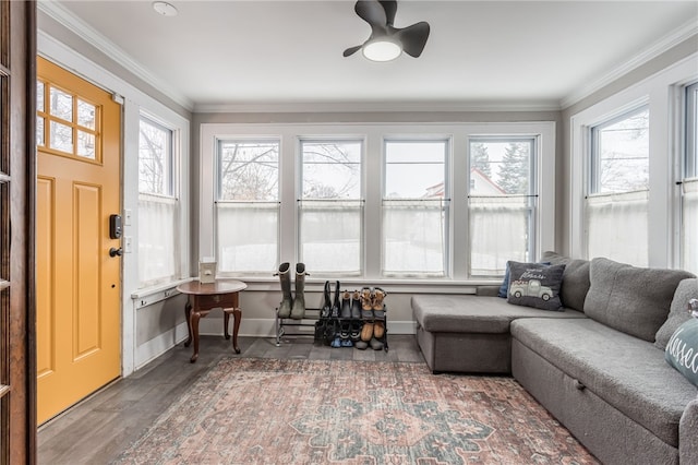 sunroom / solarium with ceiling fan and a healthy amount of sunlight