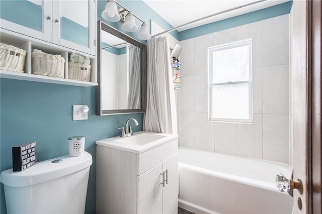 full bathroom featuring toilet, shower / bath combination with curtain, and vanity