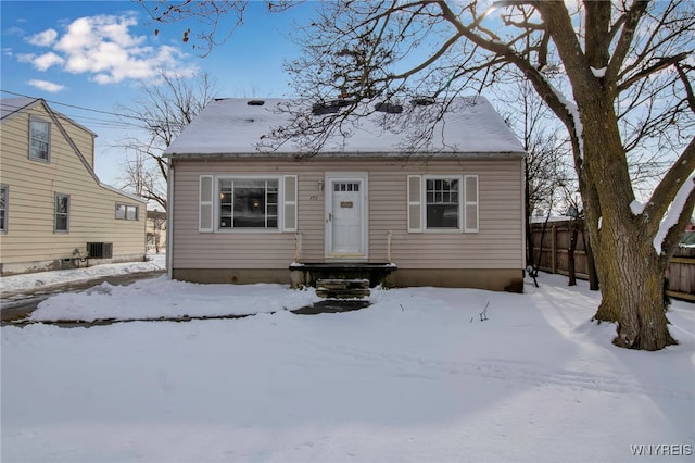 bungalow-style house featuring central AC unit