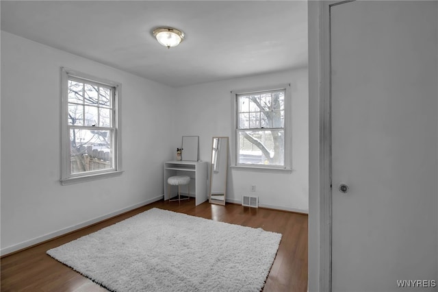 interior space with dark hardwood / wood-style floors