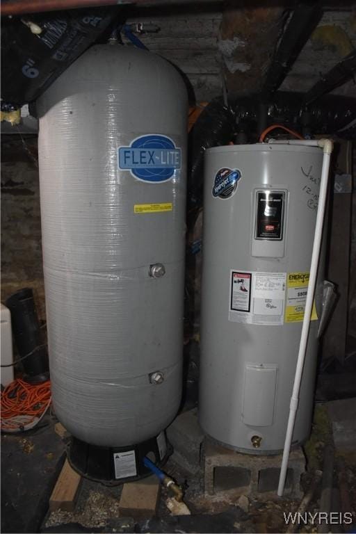 utility room featuring water heater