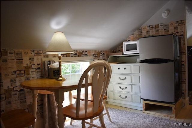 home office featuring vaulted ceiling