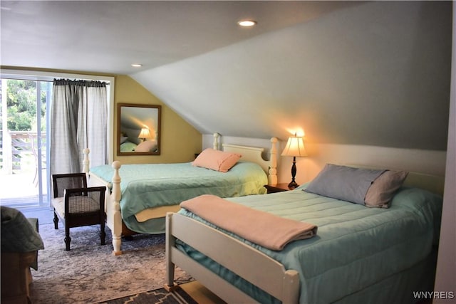 bedroom featuring access to exterior and lofted ceiling