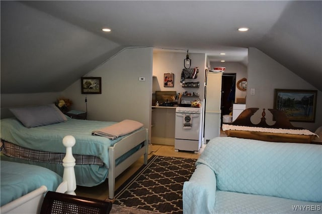 bedroom featuring lofted ceiling