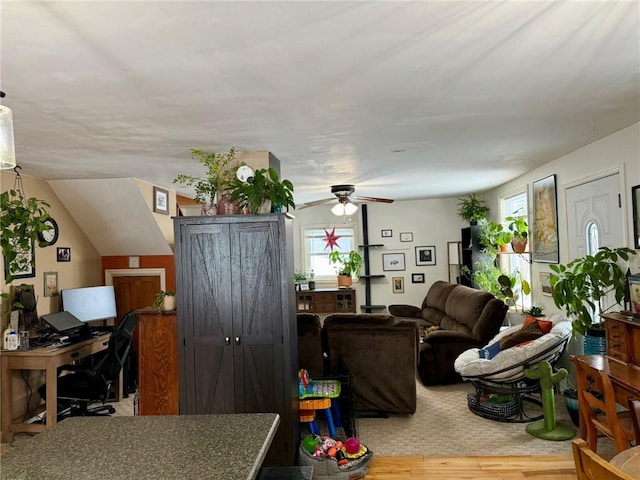 interior space featuring light wood-type flooring and ceiling fan